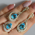 Срібний набір з золотими пластинами