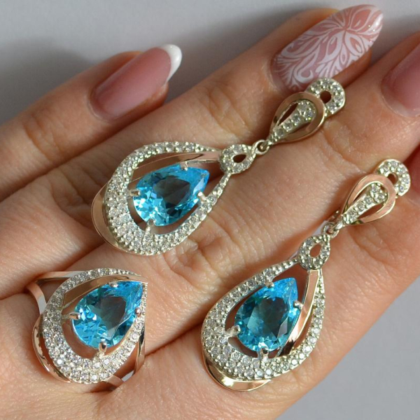 Срібний набір з золотими пластинами