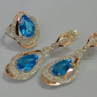 Срібний набір з золотими пластинами