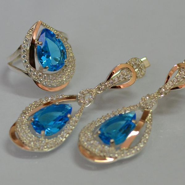 Срібний набір з золотими пластинами