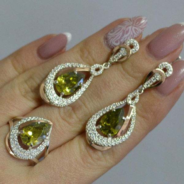 Срібний набір з золотими пластинами