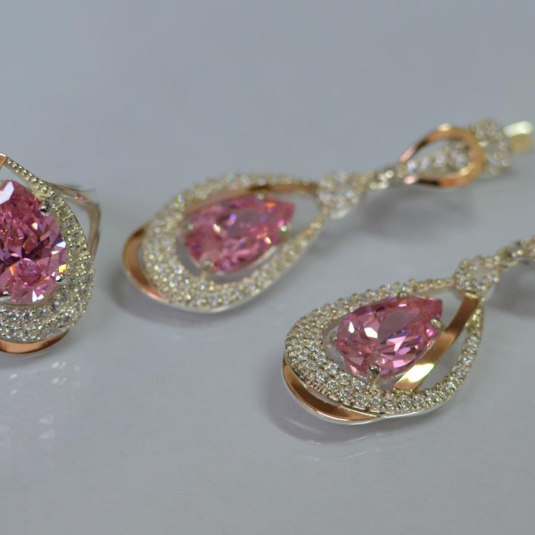 Срібний набір з золотими пластинами