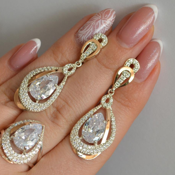 Срібний набір з золотими пластинами