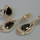 Срібний набір з золотими пластинами