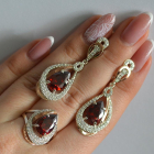 Срібний набір з золотими пластинами