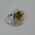 Срібна каблучка з золотими вставками