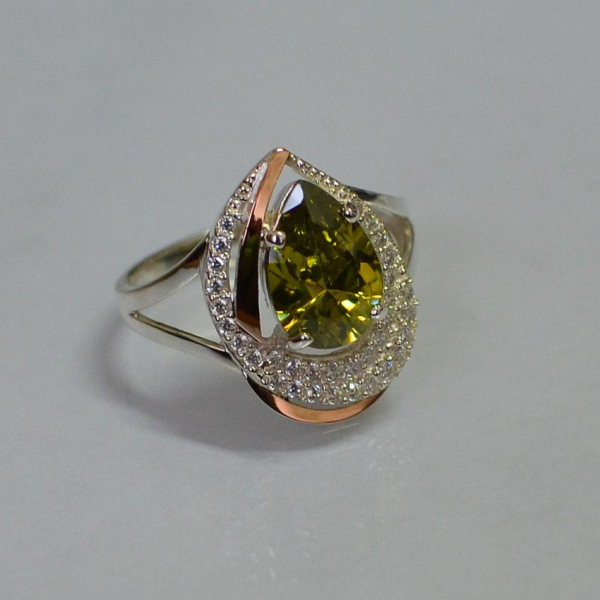 Срібна каблучка з золотими вставками