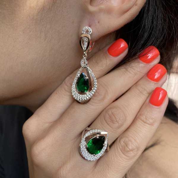 Срібна каблучка з золотими вставками