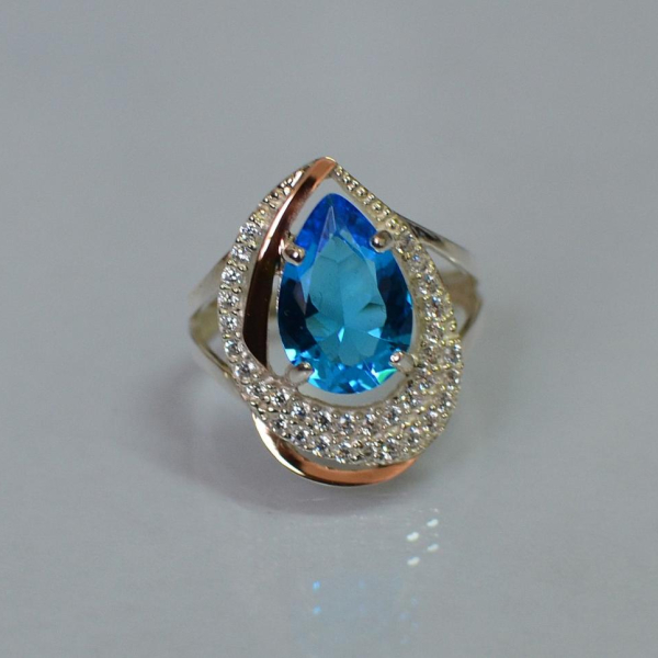 Срібна каблучка з золотими вставками