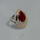 Срібна каблучка з золотими вставками