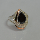 Срібна каблучка з золотими вставками