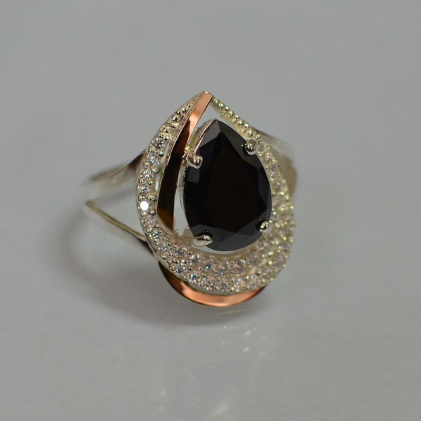 Срібна каблучка з золотими вставками