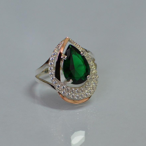 Срібна каблучка з золотими вставками