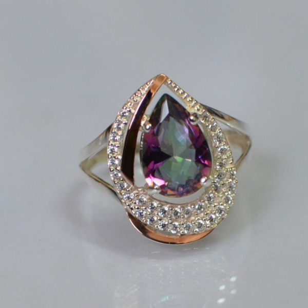 Срібна каблучка з золотими вставками