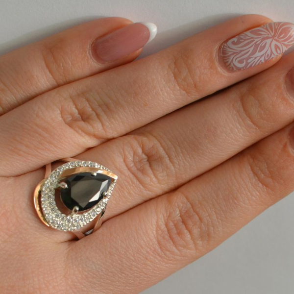 Срібна каблучка з золотими вставками