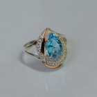 Срібна каблучка з золотими вставками