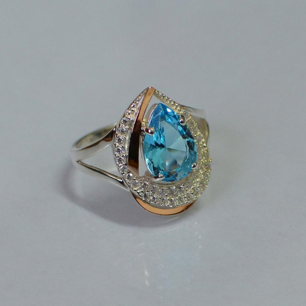 Срібна каблучка з золотими вставками