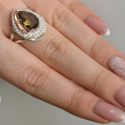 Срібна каблучка з золотими вставками