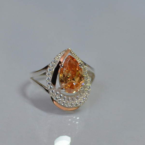 Срібна каблучка з золотими вставками