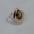 Срібна каблучка з золотими вставками