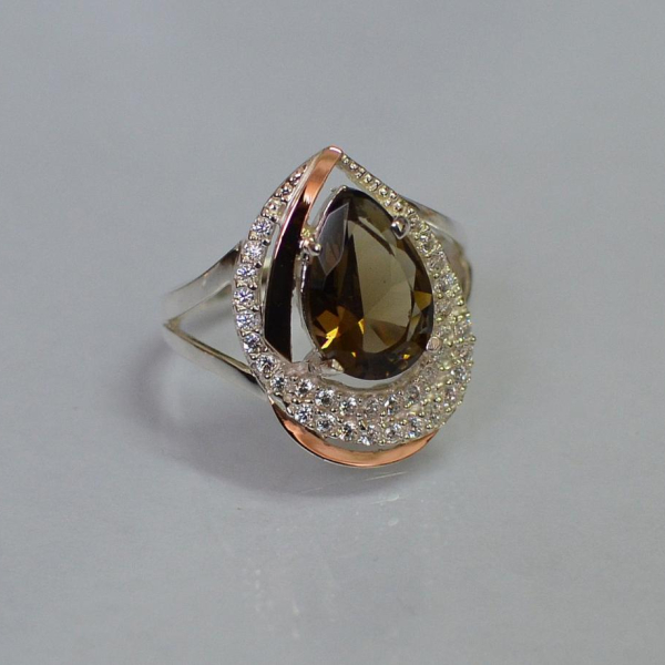 Срібна каблучка з золотими вставками