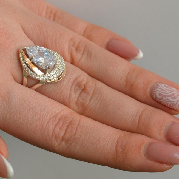 Срібна каблучка з золотими вставками