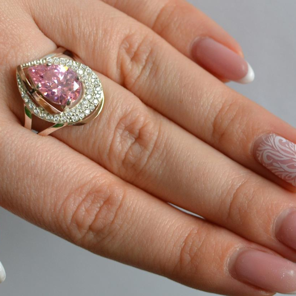 Срібна каблучка з золотими вставками