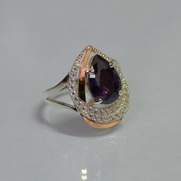 Срібна каблучка з золотими вставками