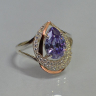 Срібна каблучка з золотими вставками