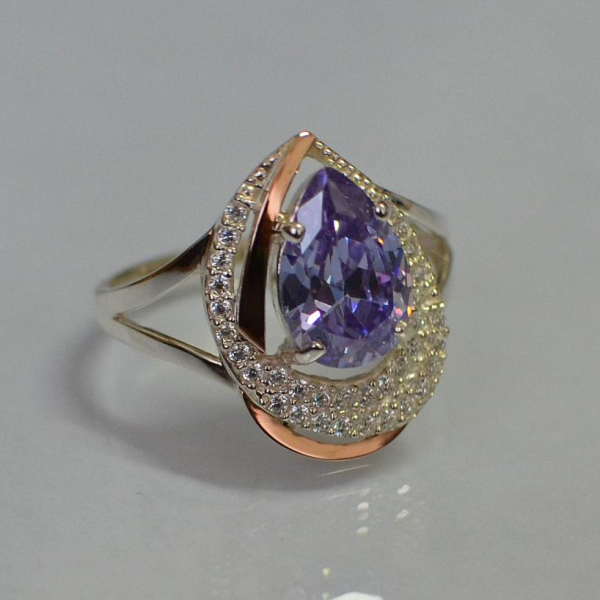 Срібна каблучка з золотими вставками