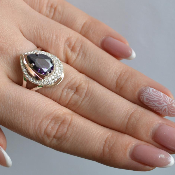 Срібна каблучка з золотими вставками