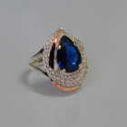 Срібна каблучка з золотими вставками