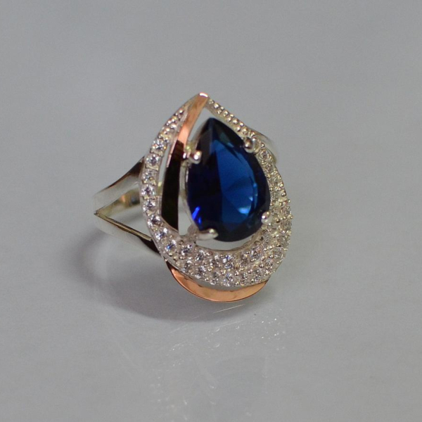 Срібна каблучка з золотими вставками