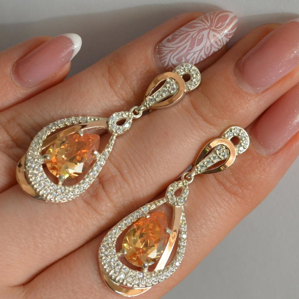 Срібні сережки з золотими вставками