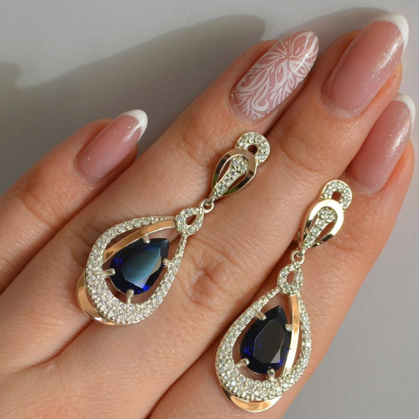 Срібні сережки з золотими вставками