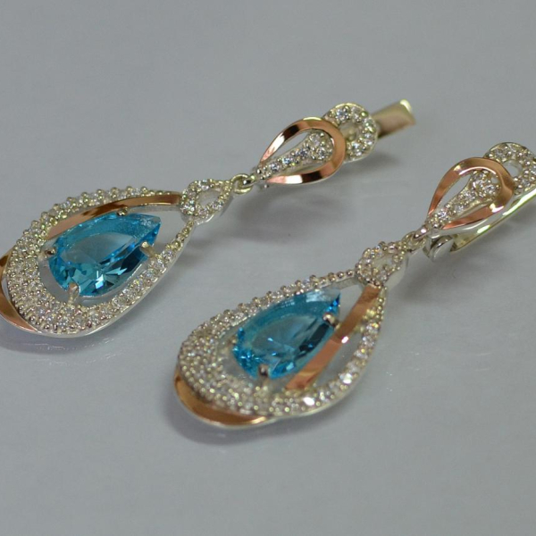 Срібні сережки з золотими вставками