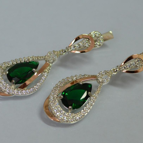 Срібні сережки з золотими вставками