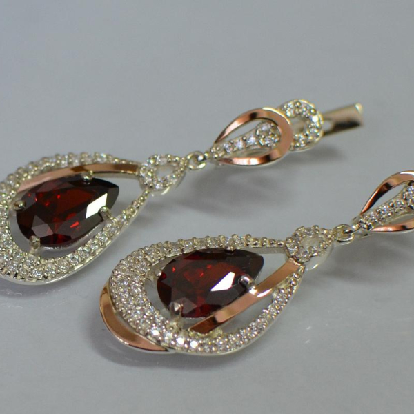 Срібні сережки з золотими вставками