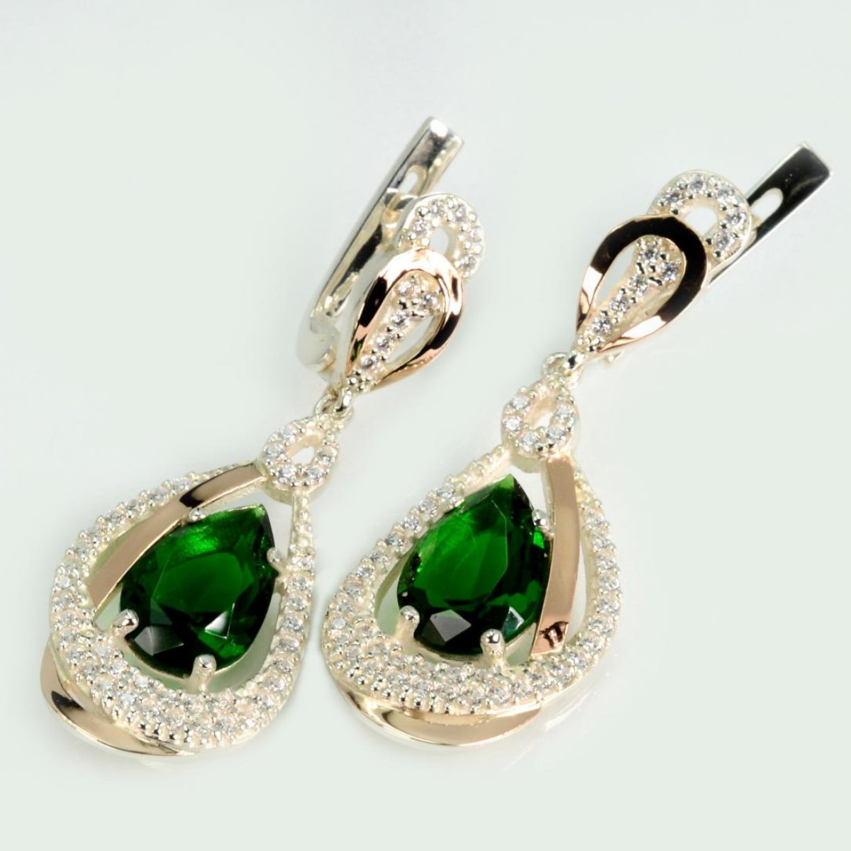 Срібні сережки з золотими вставками