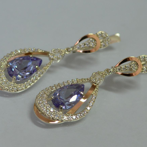 Срібні сережки з золотими вставками