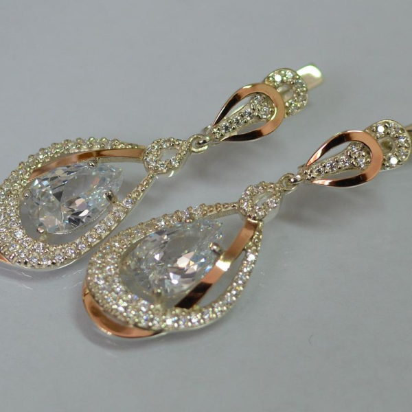 Срібні сережки з золотими вставками