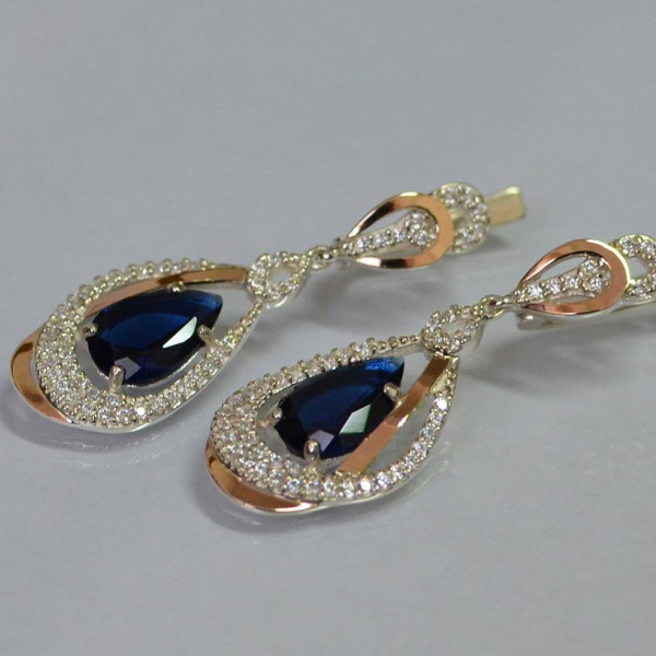 Срібні сережки з золотими вставками