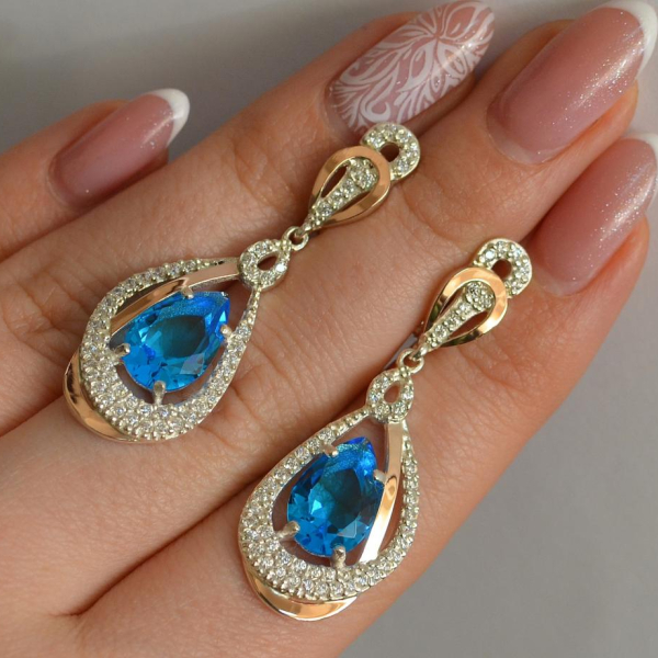 Срібні сережки з золотими вставками