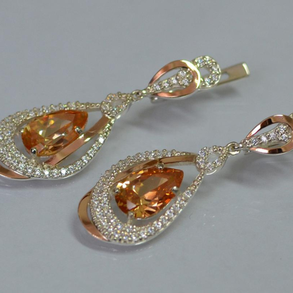 Срібні сережки з золотими вставками