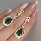 Срібні сережки з золотими вставками