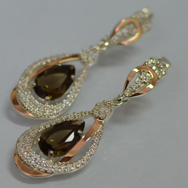 Срібні сережки з золотими вставками