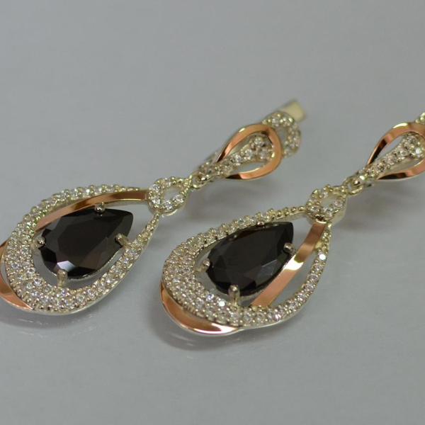 Срібні сережки з золотими вставками