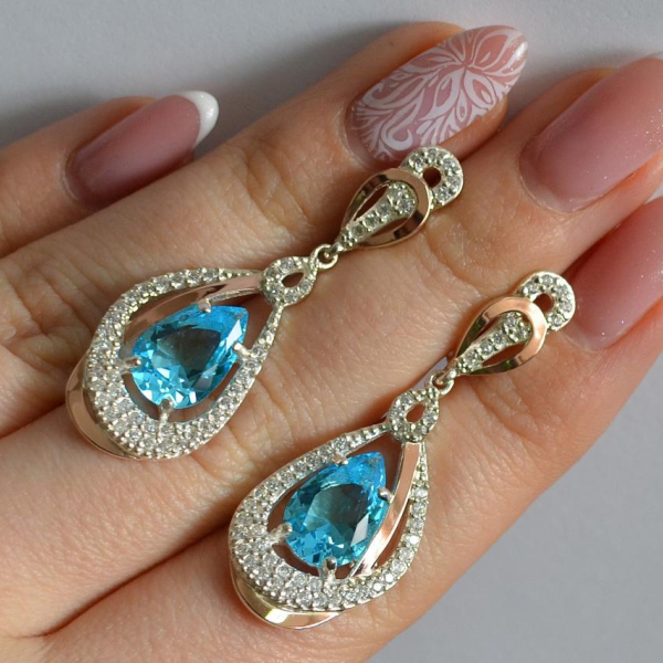 Срібні сережки з золотими вставками