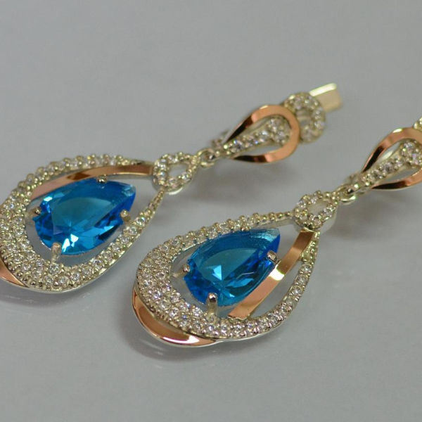 Срібні сережки з золотими вставками