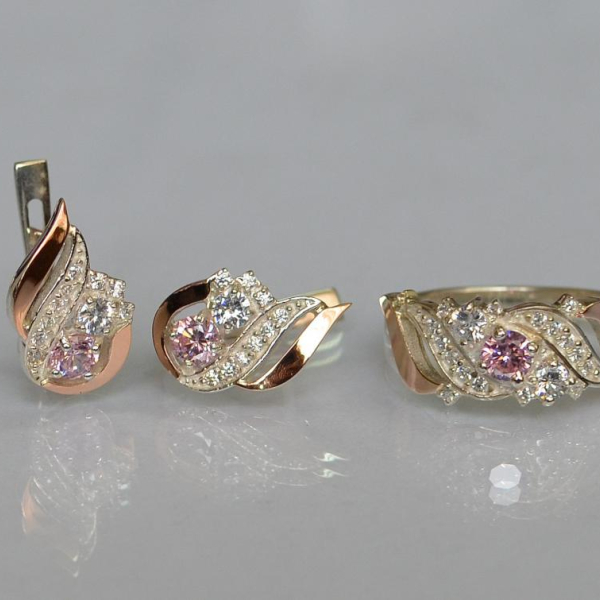 Срібний набір з золотими пластинами